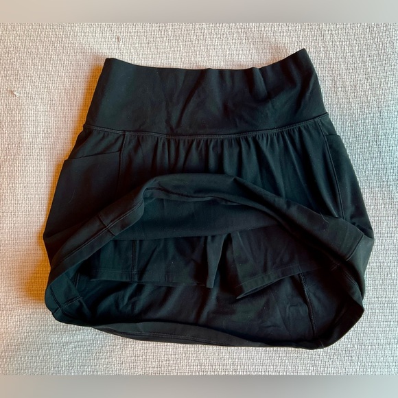Athleta salutation stash pocket skirt with 16.5” length. - Picture 7 of 7